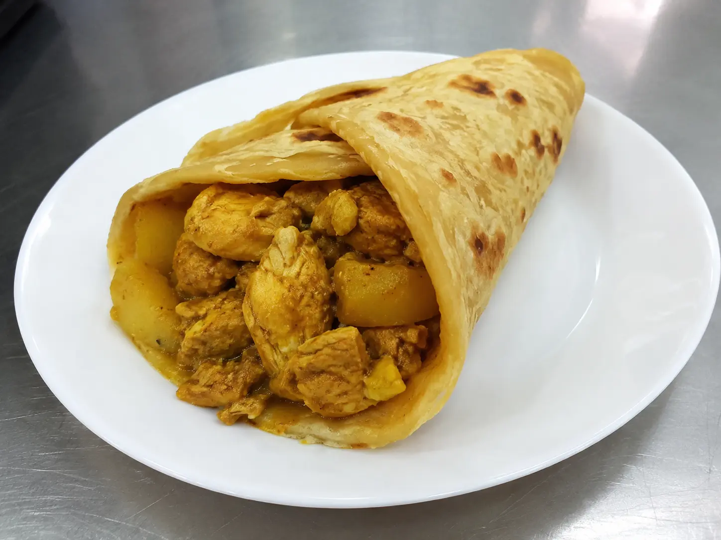 Caribbean chicken roti wrap in London, Ontario